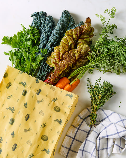 Waxed food bag with plant and jar pattern, open top for filling, yellow fabric